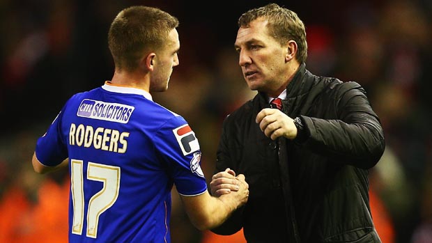 Anton Rodgers greets his father Brendan after Liverpool defeated Oldham